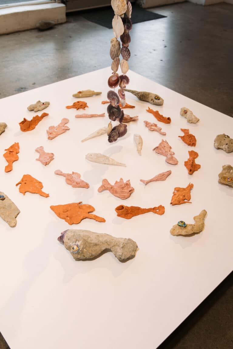 A sculptural work sits on a plinth